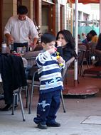 Boy making soap bubbles.