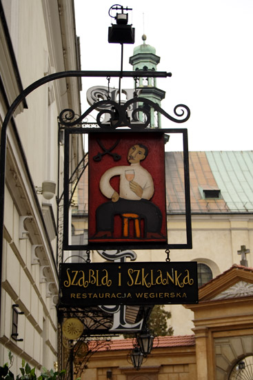 Restaurant sign in Krakow.