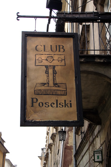 Sign with a pillory in Krakow.