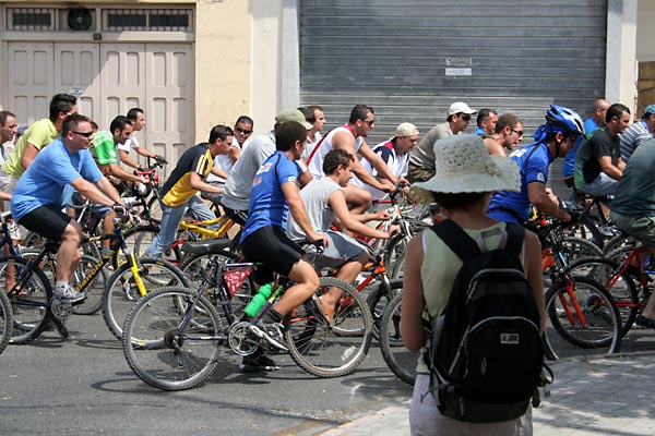 Cyclists in a religious procession in Tarxien
