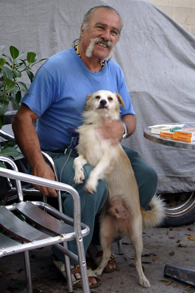 A Maltese with his dog