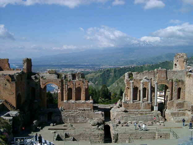 The Greek theatre in Taormina with Etna in the background