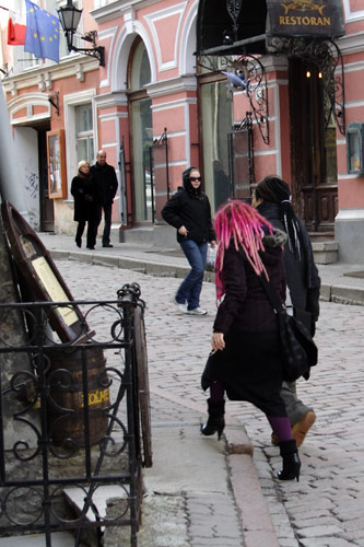 Girl with red hair and impractical boots