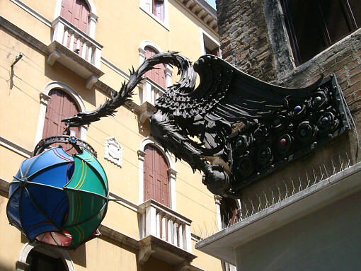 Dragon with a street light in its mouth