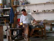 Glassmaker in his workshop (50 kb)