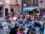 Spectators on the square (83 kb)